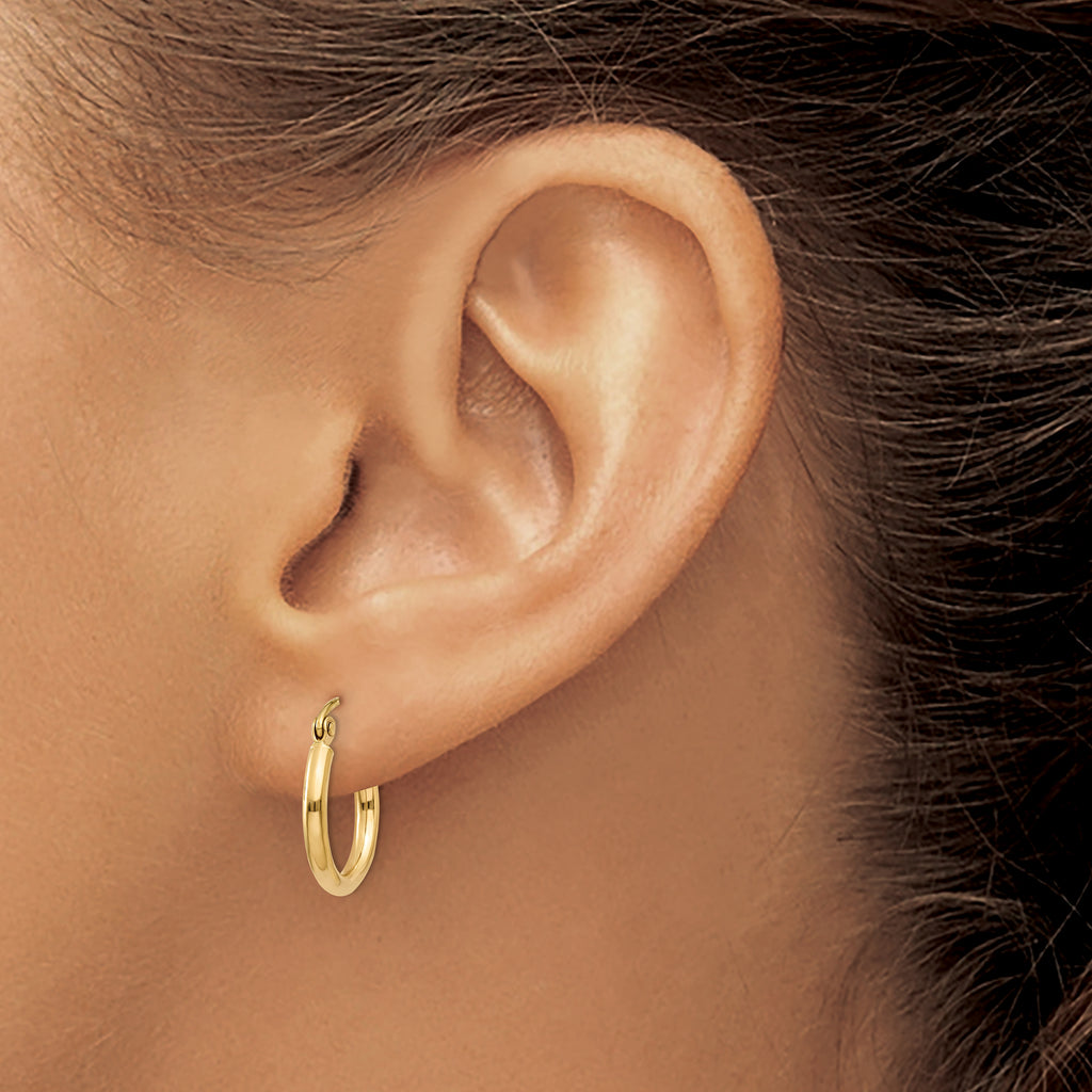 14K yellow gold small hoop earrings.