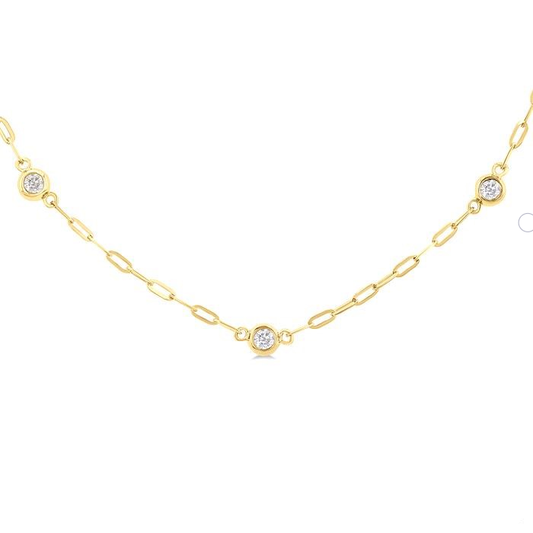 Yellow gold bracelet with round diamonds.