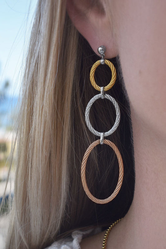 Stainless steel cable drop earrings.