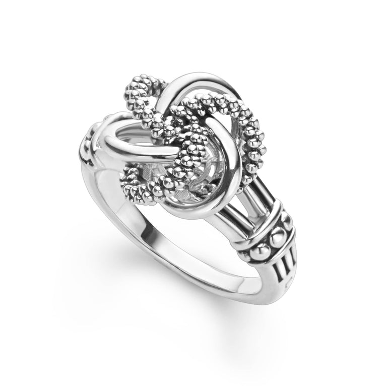 Sterling silver love knot ring, intricate design.