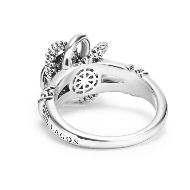 Sterling silver love knot ring, intricate design.