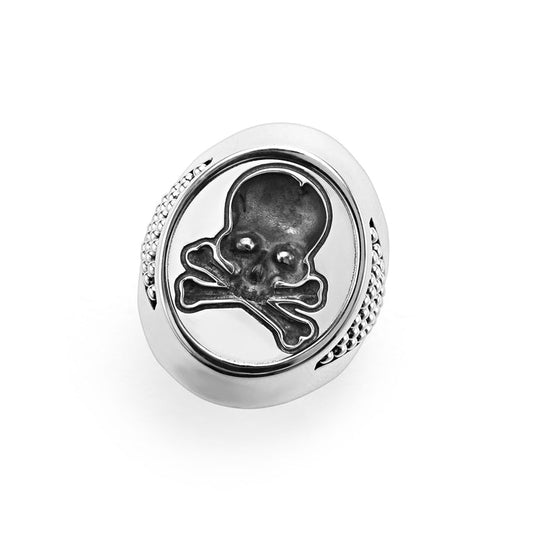 Sterling silver ring with skull design.