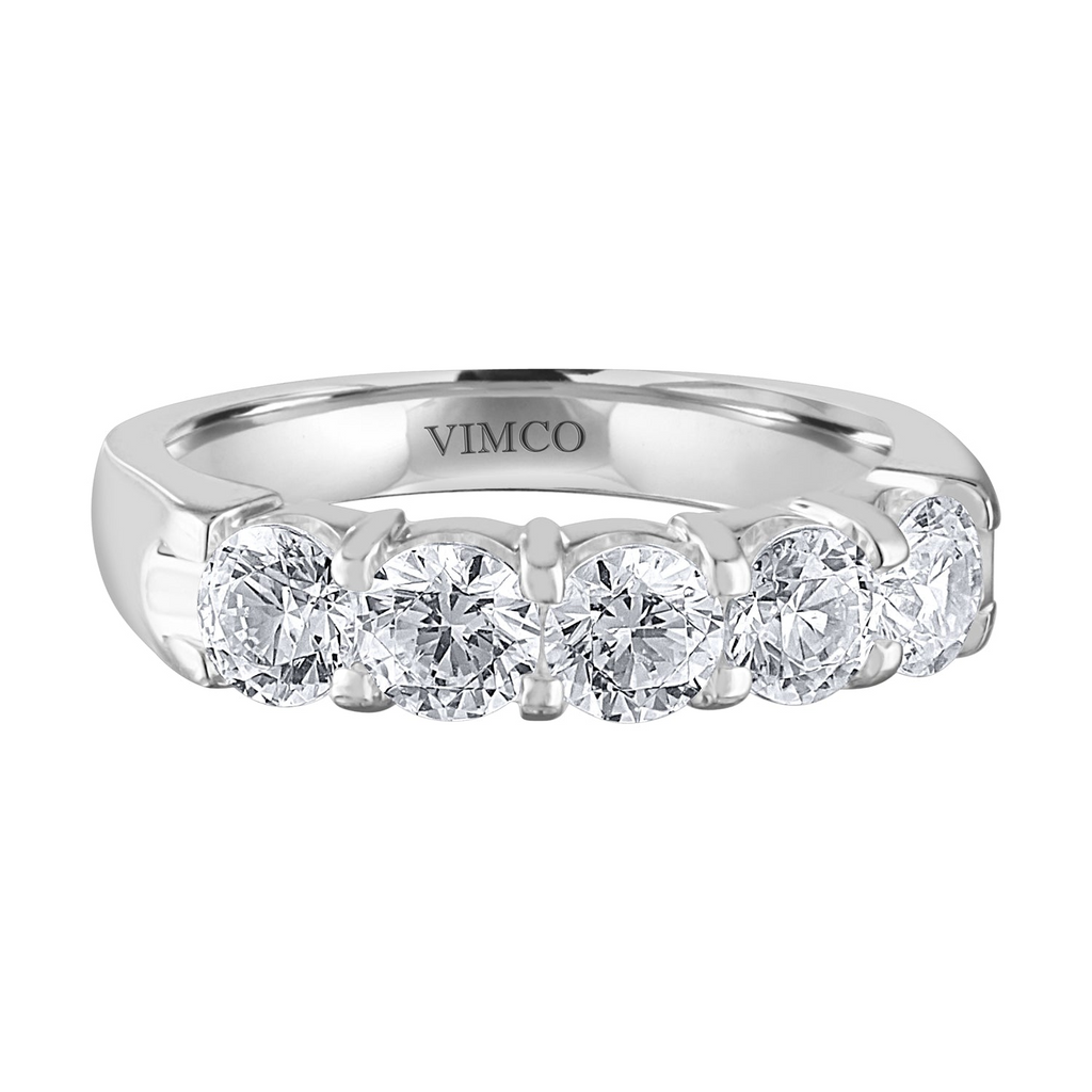 Five-diamond white gold wedding band.