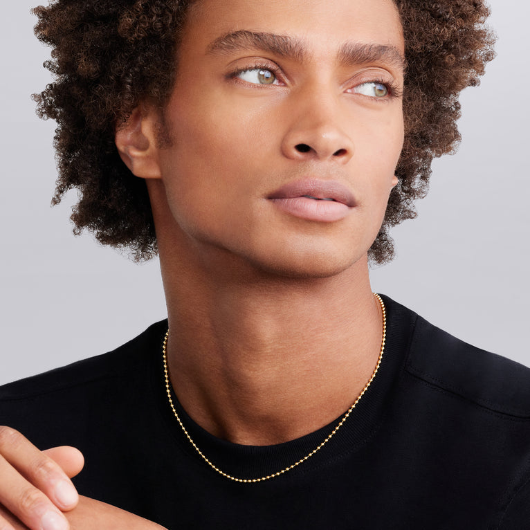 18K yellow gold polished ball chain.