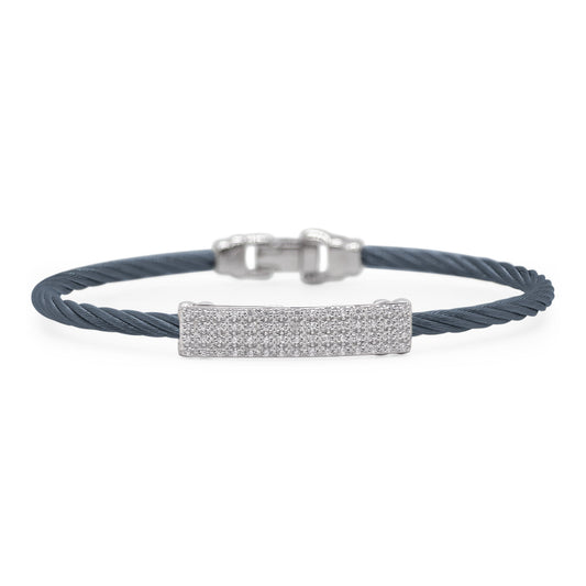 Blue cable bracelet with diamond bar.