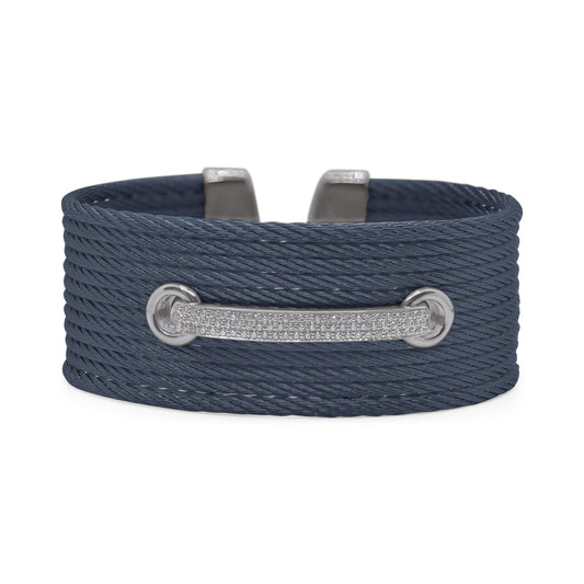 Blue cuff bracelet with diamond accents.