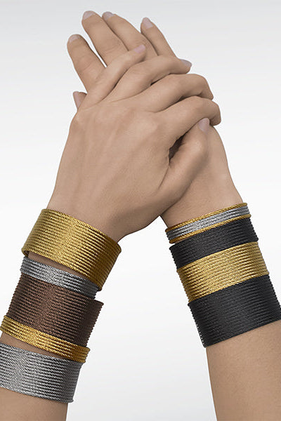 Stainless steel grey cable cuff bracelet.