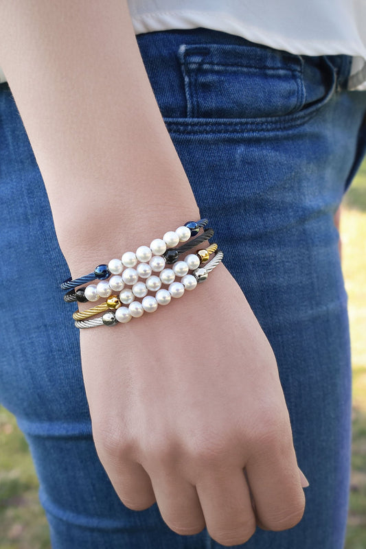 Black cable bracelet with freshwater pearls.