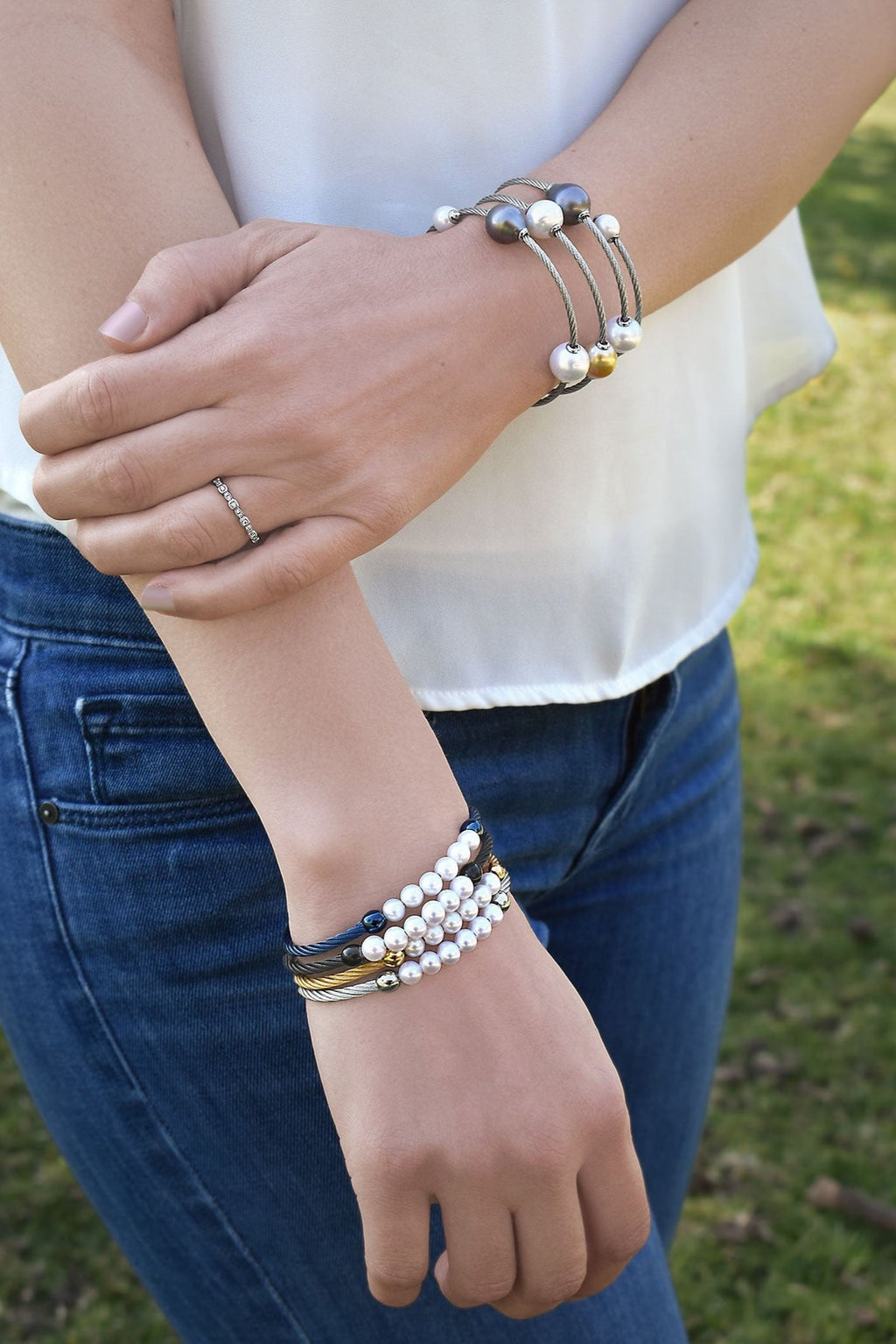 Black cable bracelet with freshwater pearls.