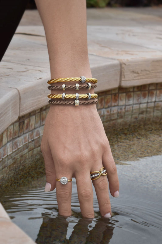 Stainless steel bracelet with round diamonds.