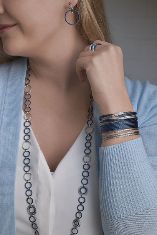 Stainless steel blue bangle bracelet stack.
