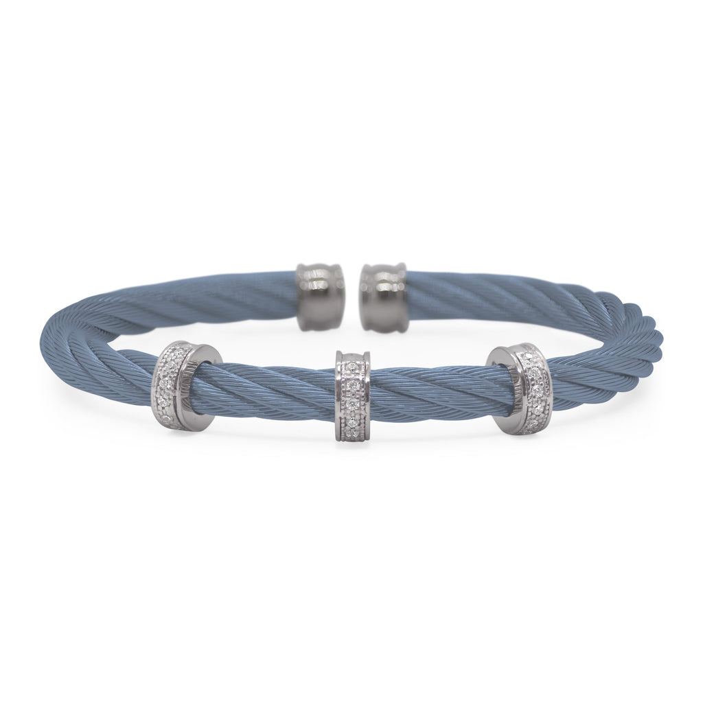 Blue cable bracelet with diamond accents.
