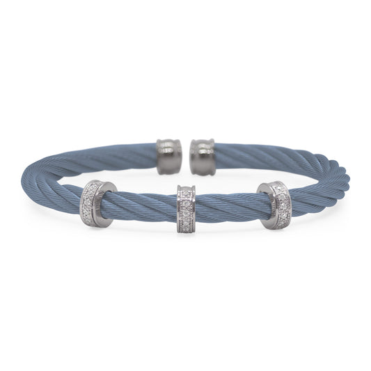 Blue cable bracelet with diamond accents.