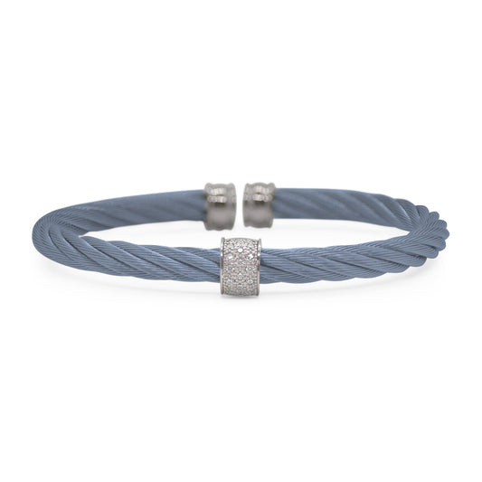 Blue cable bracelet with diamond accents.