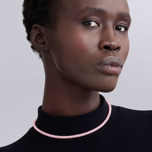 Sterling silver and ceramic necklace, pink caviar design.