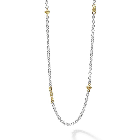 Sterling silver necklace with gold accents.