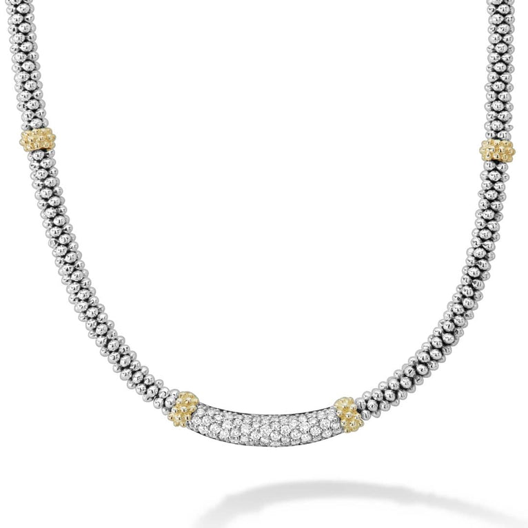 Sterling silver necklace with yellow diamond accents.