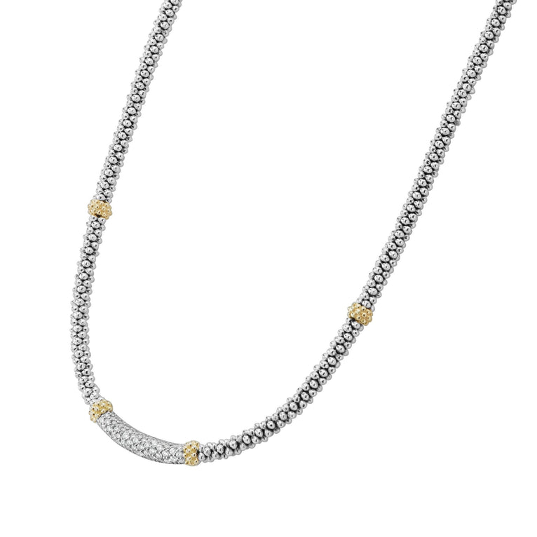 Sterling silver necklace with yellow diamond accents.
