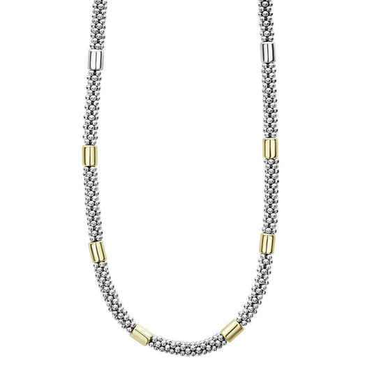 Sterling silver necklace with gold accents.