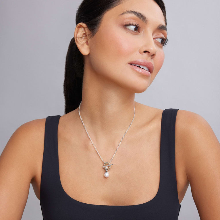Sterling silver necklace with pearl centerpiece.