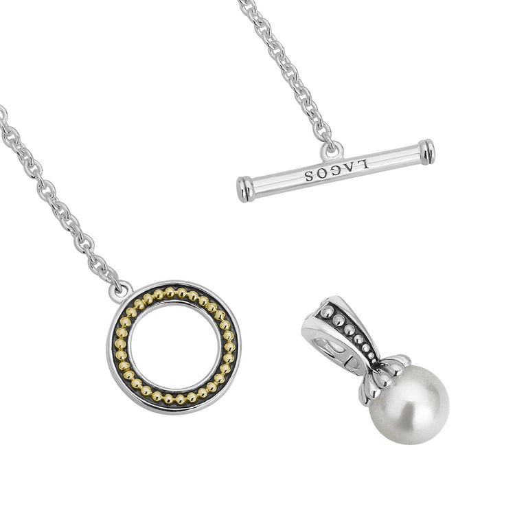 Sterling silver necklace with pearl and gold accents.