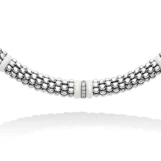 Sterling silver necklace with round diamonds.