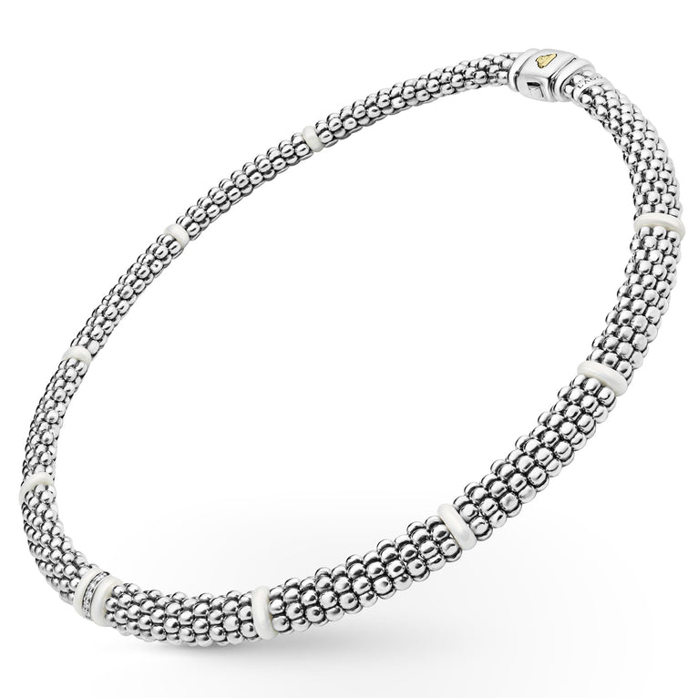 Sterling silver necklace with diamond accents.