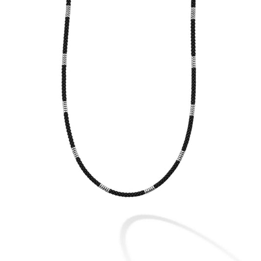 Sterling silver necklace with black ceramic accents.