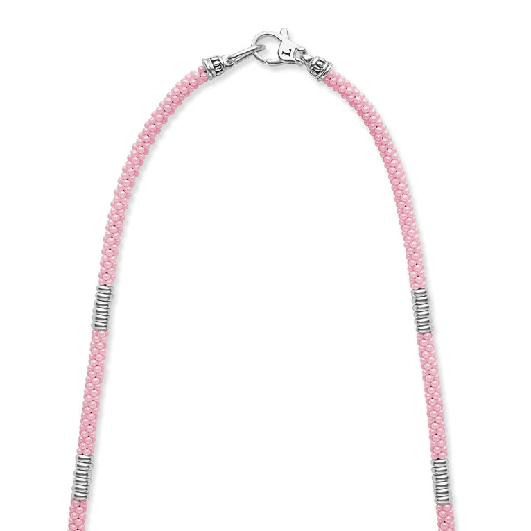 Pink beaded necklace with silver accents.