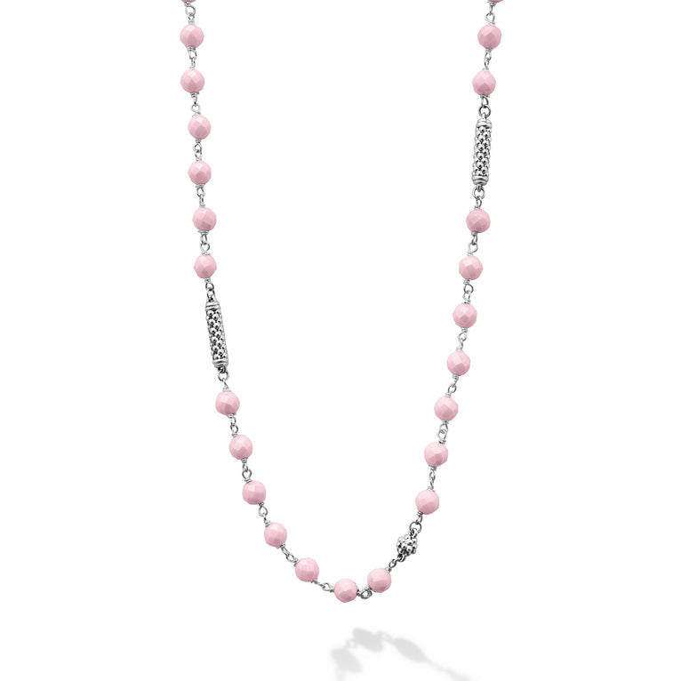 Sterling silver necklace with pink ceramic links.