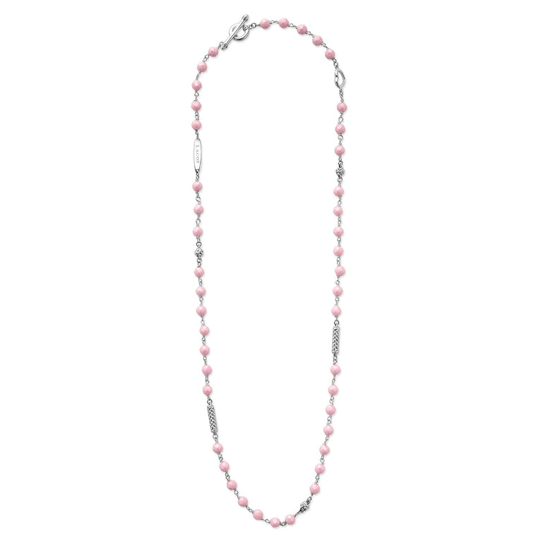 Sterling silver necklace with pink ceramic links.