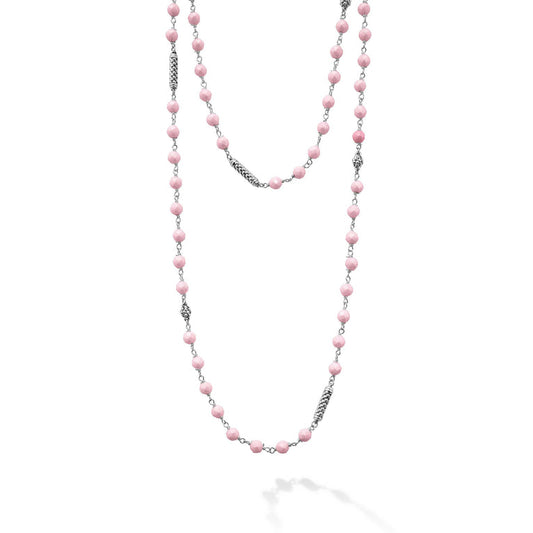 Sterling silver necklace with pink ceramic beads.