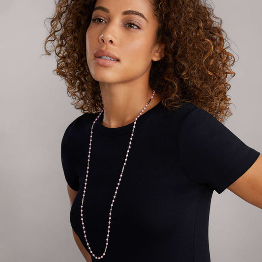 Sterling silver necklace with pink ceramic beads.