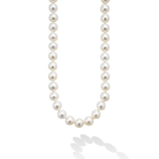Pearl strand necklace with gemstones.