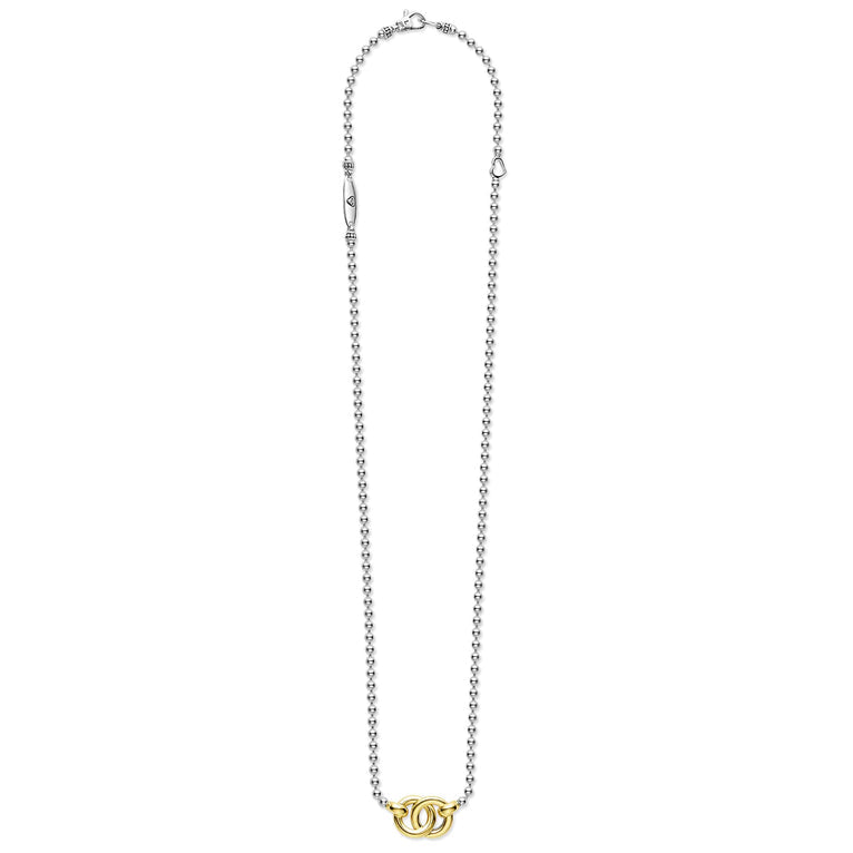 Sterling silver necklace with gold accents.