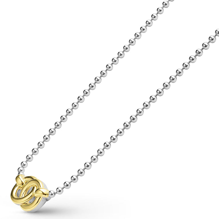 Sterling silver necklace with gold knot detail.