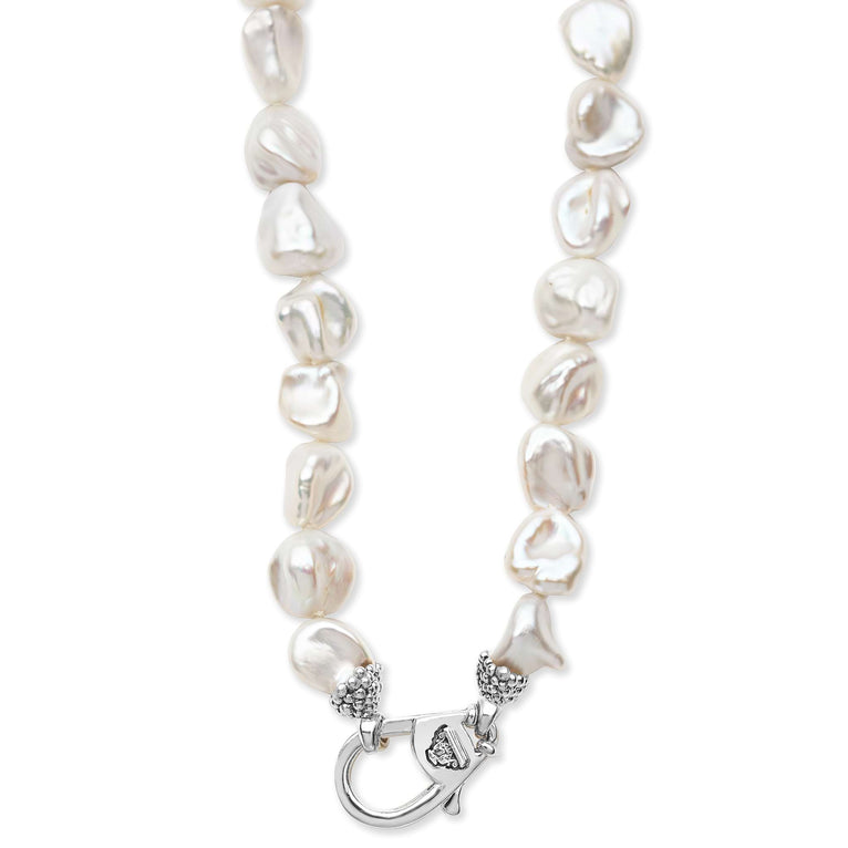 Baroque pearl necklace with silver clasp.
