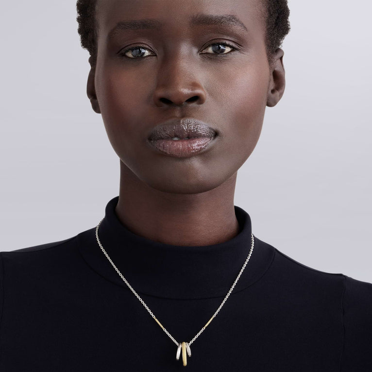 Sterling silver necklace with diamond accents.