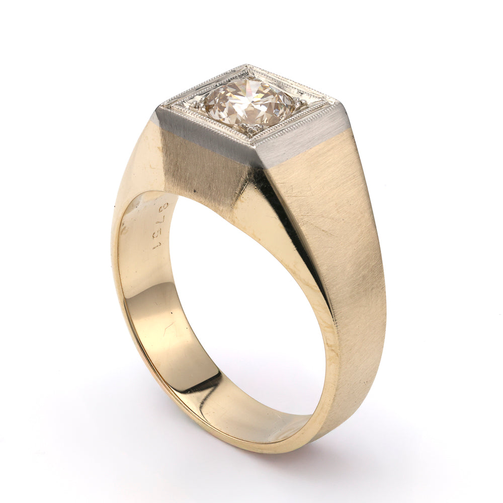 14K gold ring with round diamond centerpiece.