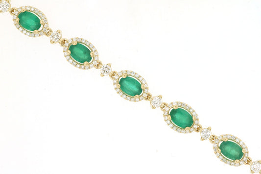 Royal Jewelry Manufacturing Inc. Color Gemstone Bracelet with 13 Oval Emeralds 5.70ctw in 14 Karat Yellow Gold