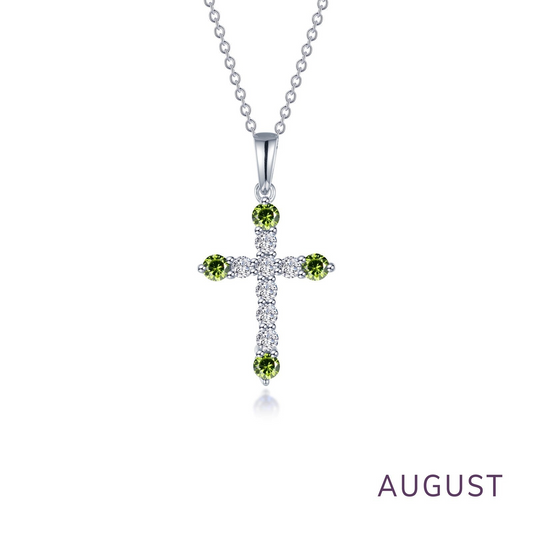 Cross necklace with peridot and diamond accents.