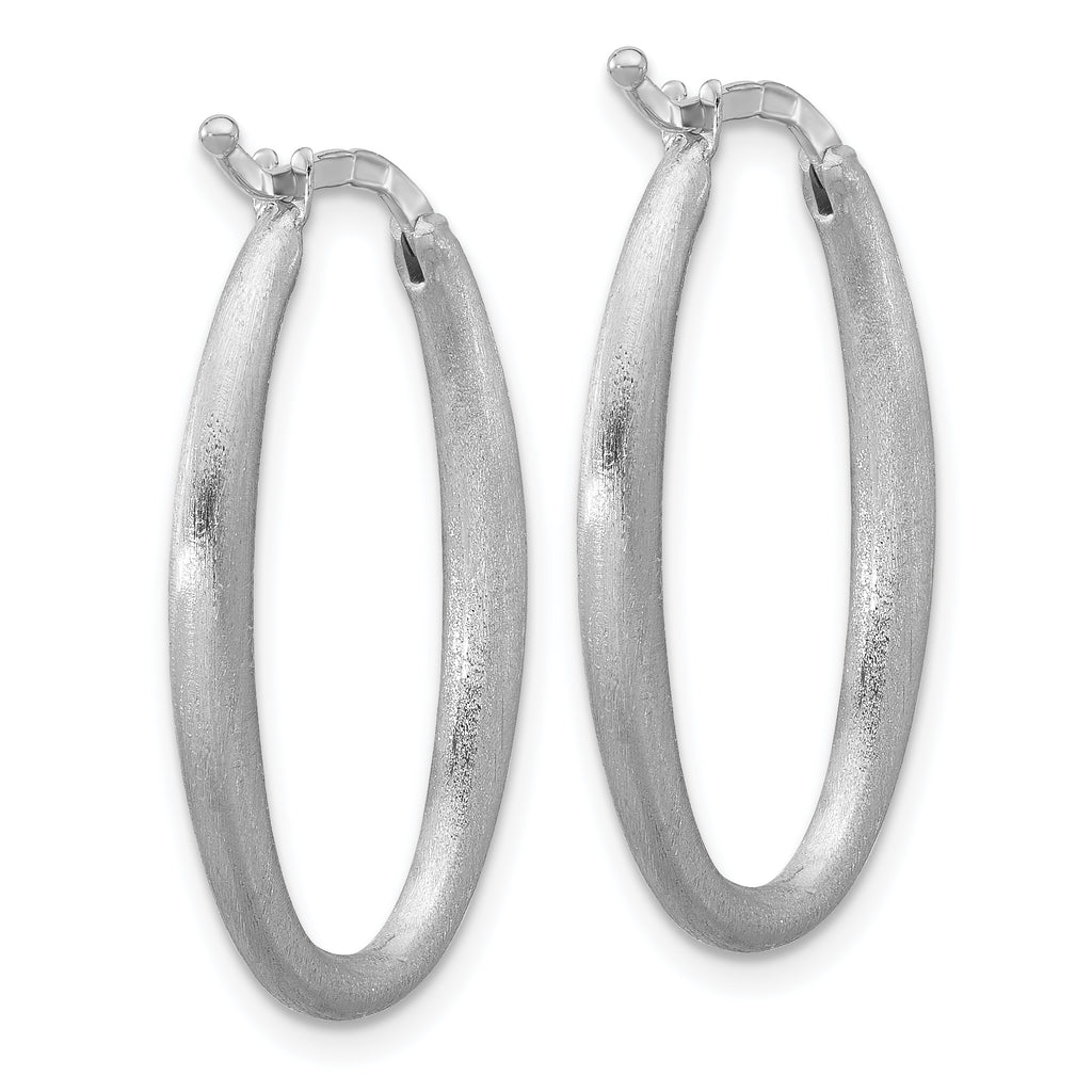 Brushed sterling silver oval hoop earrings.