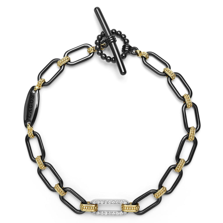 Black ceramic bracelet with yellow diamond links.