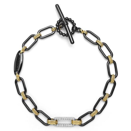 Black ceramic bracelet with yellow diamond links.