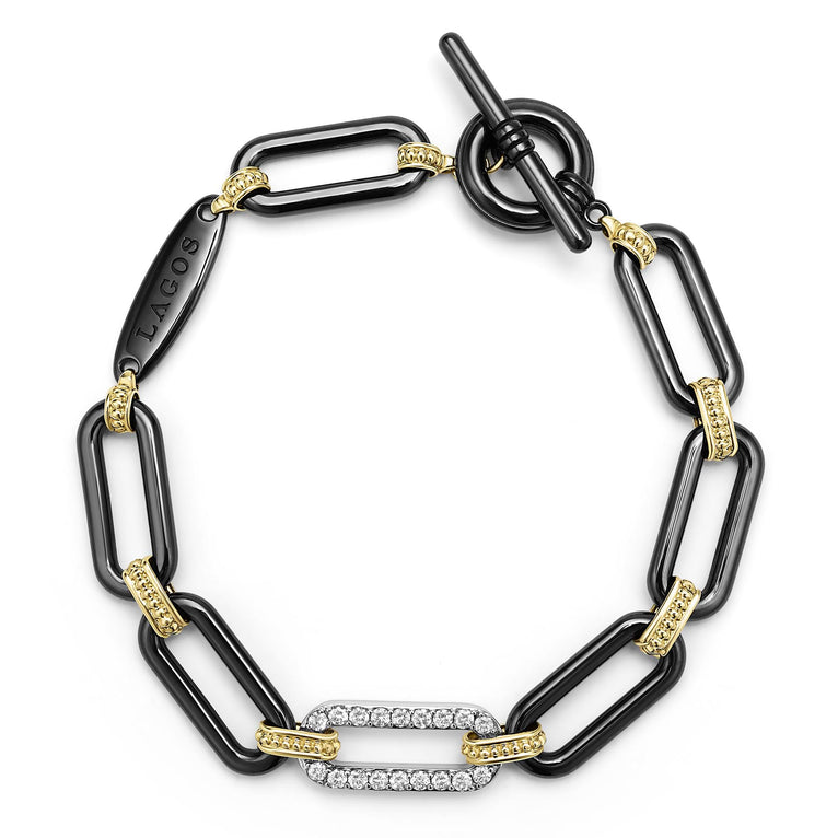 Black ceramic bracelet with yellow diamond accents.