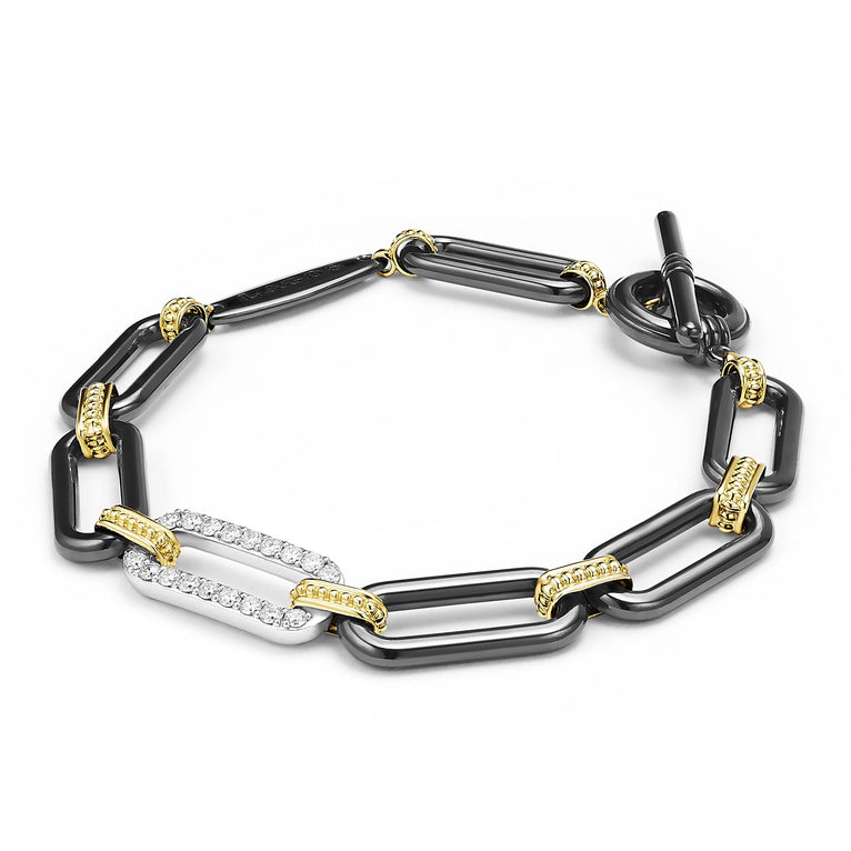 Black ceramic bracelet with yellow diamond accents.