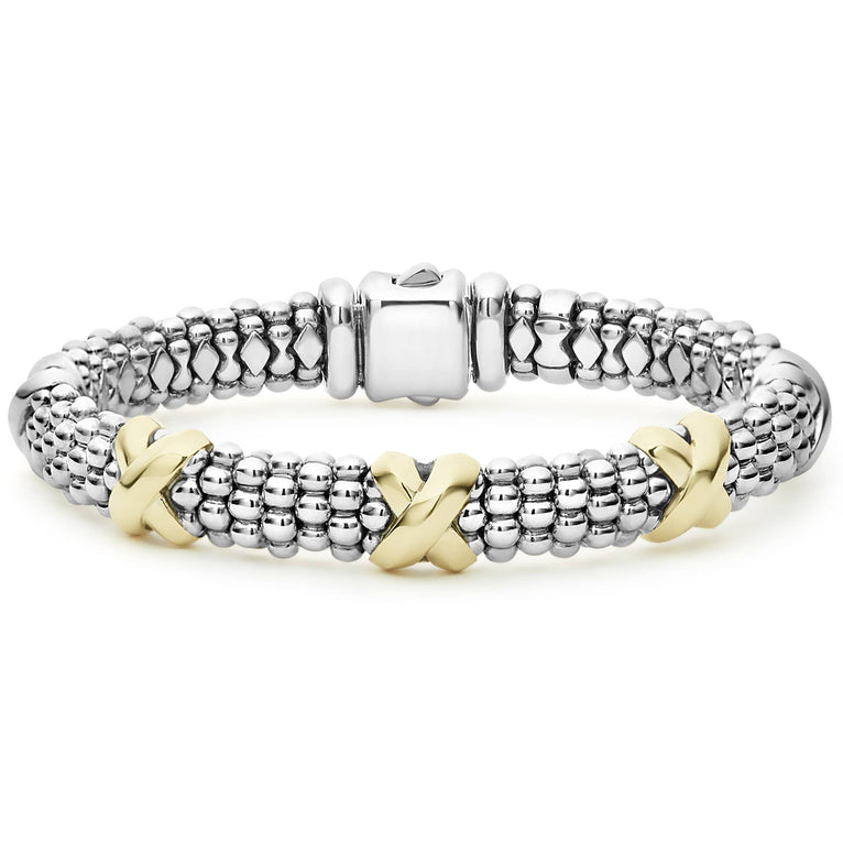Sterling silver bracelet with gold accents.