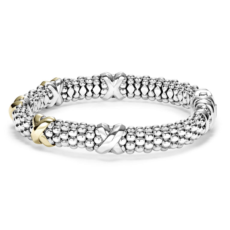 Sterling silver bracelet with gold accents.