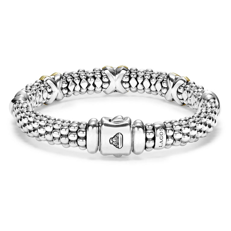 Sterling silver bracelet with gold accents.