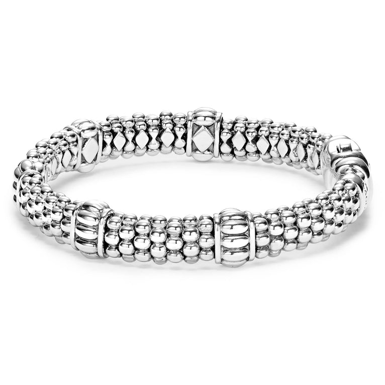 Sterling silver bracelet with beaded stations.